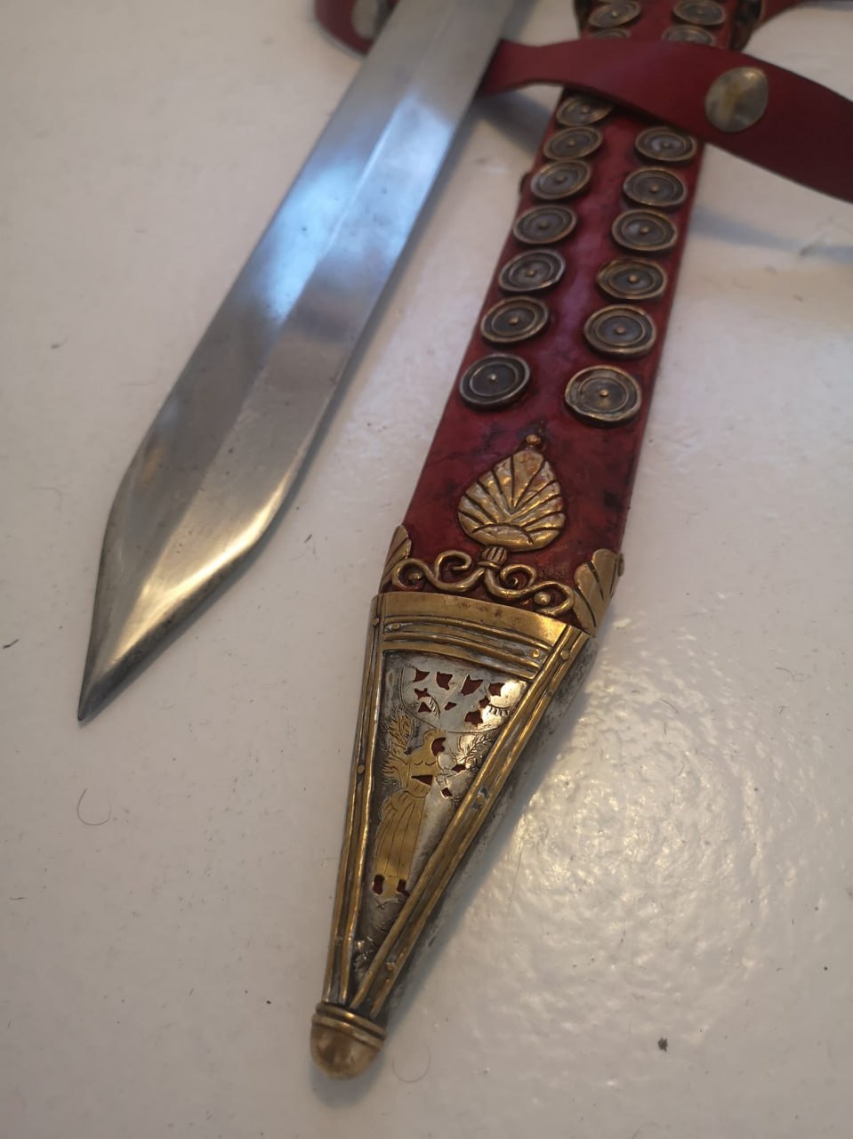 Cleaning a unique find in Pompeii—a Roman gladius from the second half of the first century AD in a decorated scabbard. "The sword's total length, including the hilt, is 69.2 cm. T