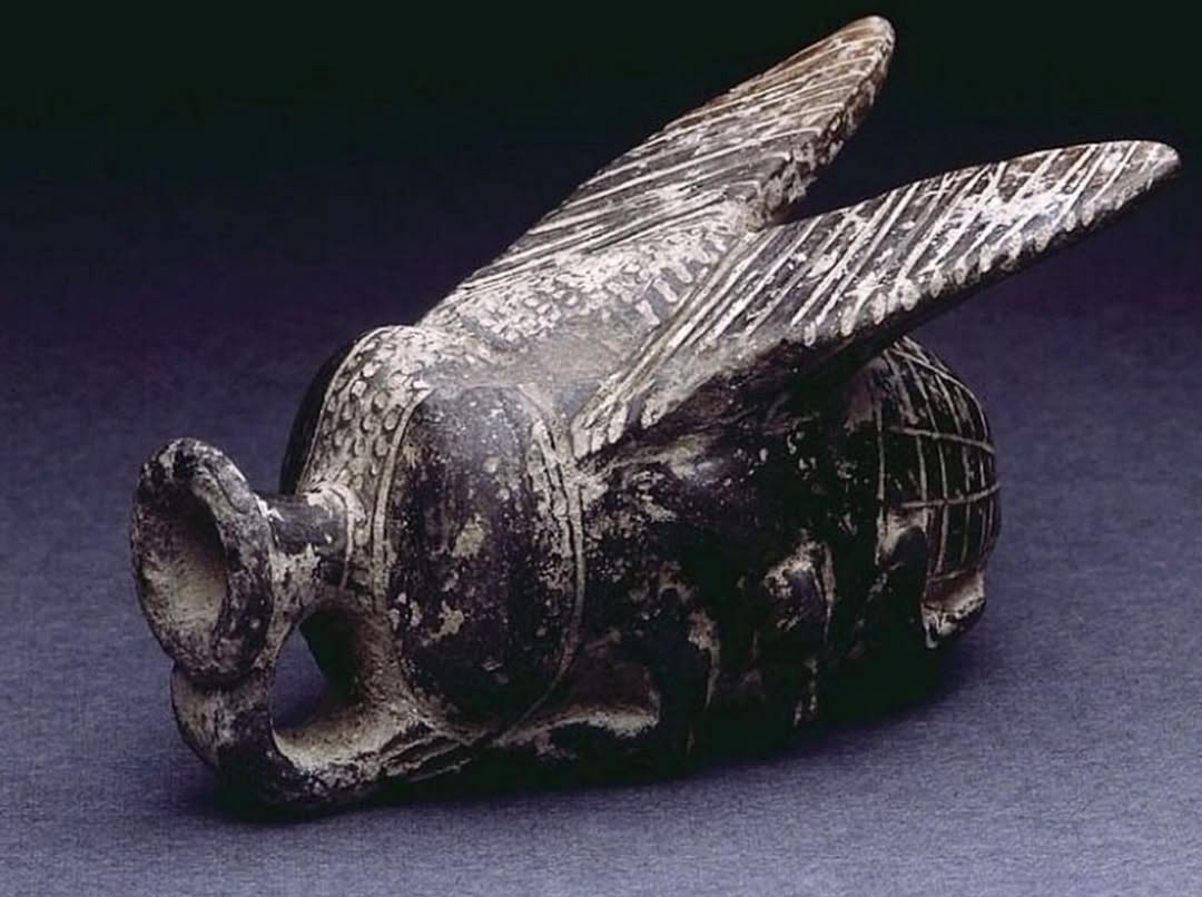 A tiny ceramic vessel in the shape of a fly, Ancient Egypt, late Second Intermediate Period, 15th Dynasty, c. 1550 BC. Its dimensions are just over 5 cm (height 5.4 cm, width 5 cm)